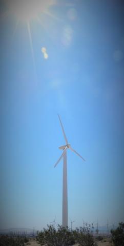 lone windmill filtered with lensflare by Jeremy Heminger